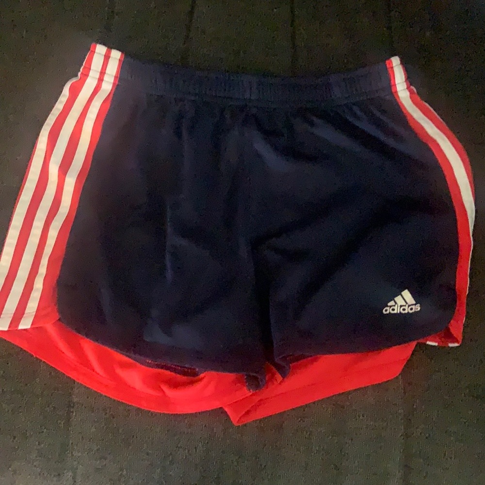 Red white and navy blue adidas shorts